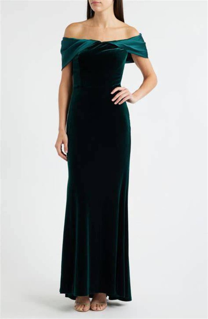A guest wore a semi-sheer dress alongside a leather wraparound crop top.