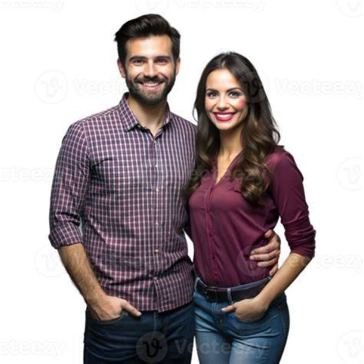 a man and woman standing next to each other