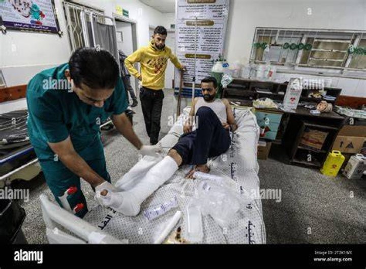 A Palestinian wounded in the Israeli bombardment sits in a hospital In Rafah, Gaza Strip, Saturday, Feb. 10, 2024. (AP Photo/Hatem Ali)