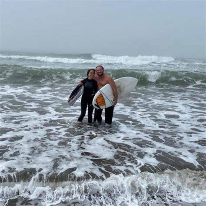 A surfer, identified by friends as Eric, (not pictured) has been left in a critical condition after being attacked by a shark off a California beach