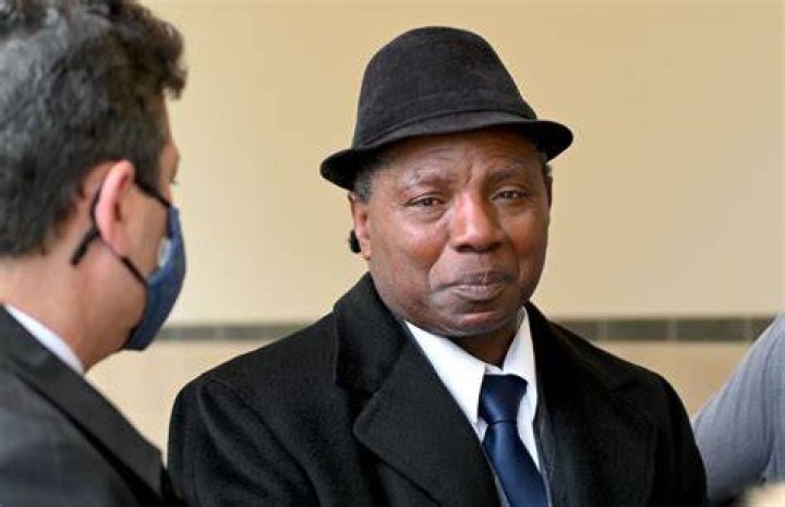 Anthony Broadwater (centre), 61, reacts to Judge Gordon Cuffy overturning the 40-year-old rape conviction that wrongfully put him in state prison for Alice Sebold's rape