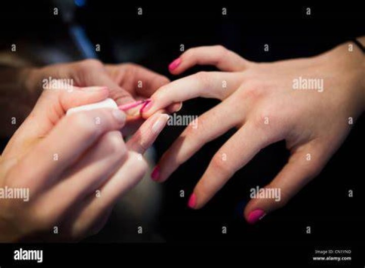 Bride having her nails painted