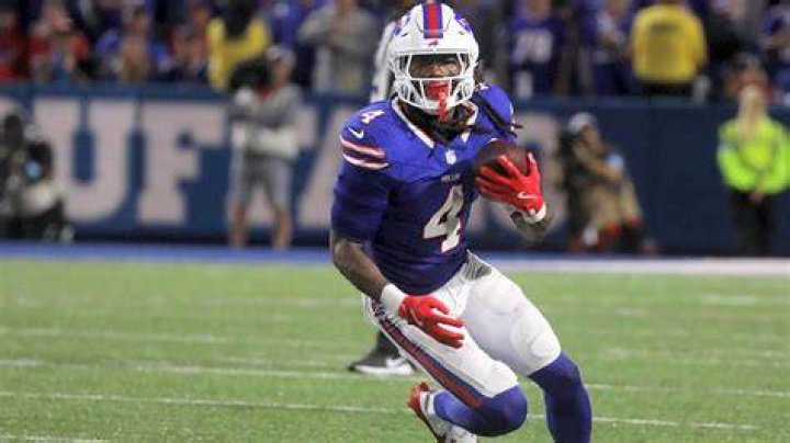 Buffalo Bills running back Damien Harris is attended to by medical staff after taking a hard hit against the New York Giants during the first half of an NFL football game in Orchard Park, N.Y., Sunday, Oct. 15, 2023. (AP Photo/Adrian Kraus)