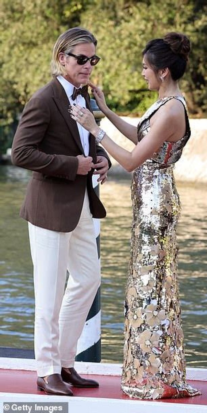 Colour scheme: Chris opted for a pair of taupe trousers, teamed with a tuxedo shirt and chocolate brown blazer