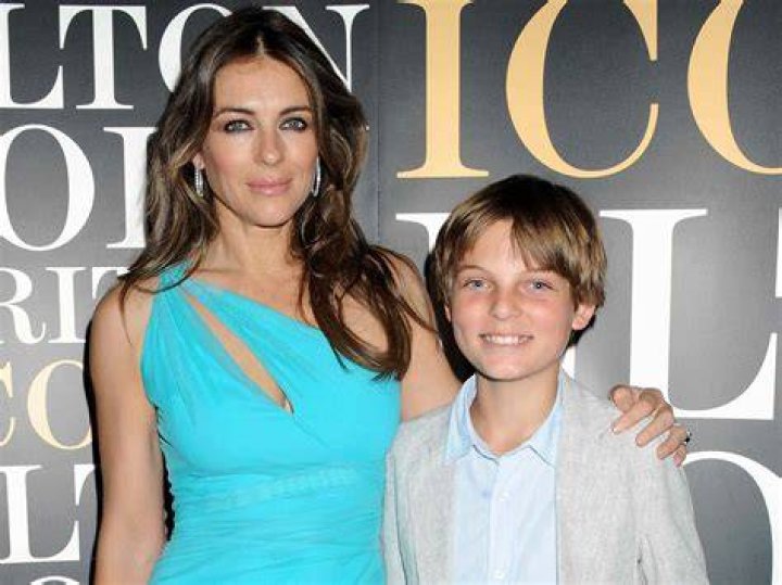 Elizabeth Hurley and Damian in a swimming pool