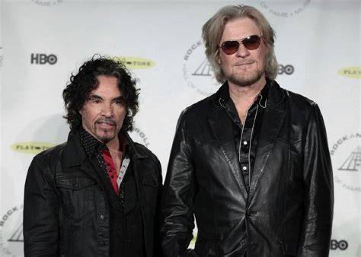 FILE - Daryl Hall, left, and John Oates, recipients of BMI Icons awards, pose together before the 56th annual BMI Pop Awards in Beverly Hills, Calif., on May 20, 2008. Hall has sued his longtime music partner John Oates, arguing that his plan to sell off his share of a joint venture would violate a business agreement the duo had.(AP Photo/Chris Pizzello, File)