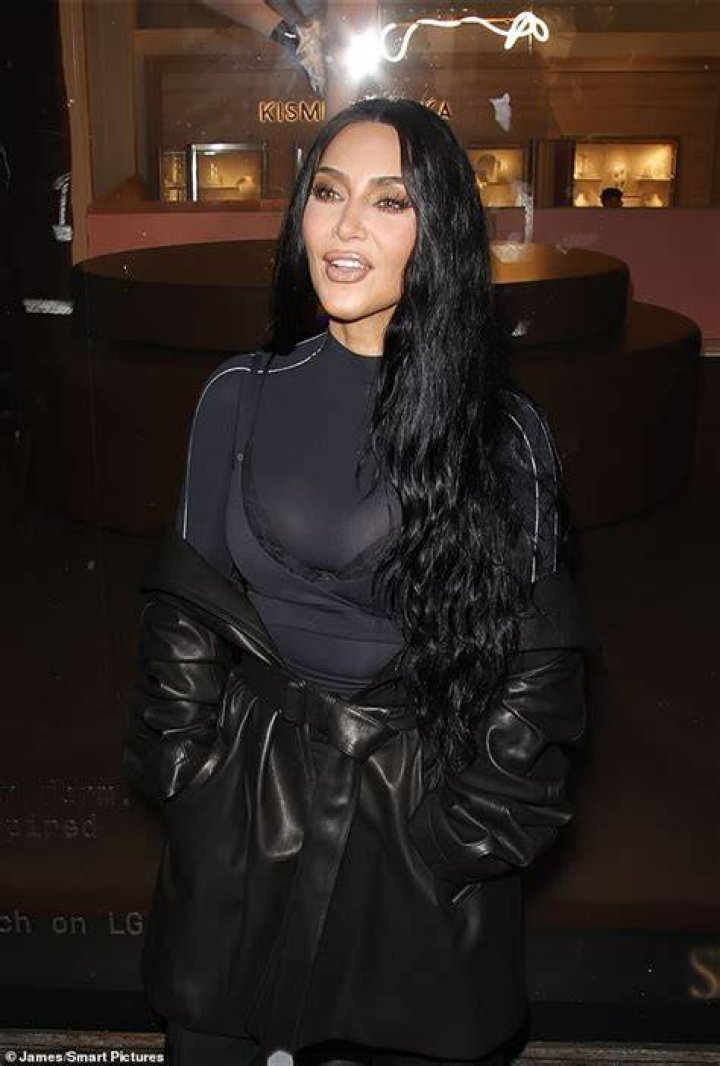 Glam: Kim was seen enjoying a drink