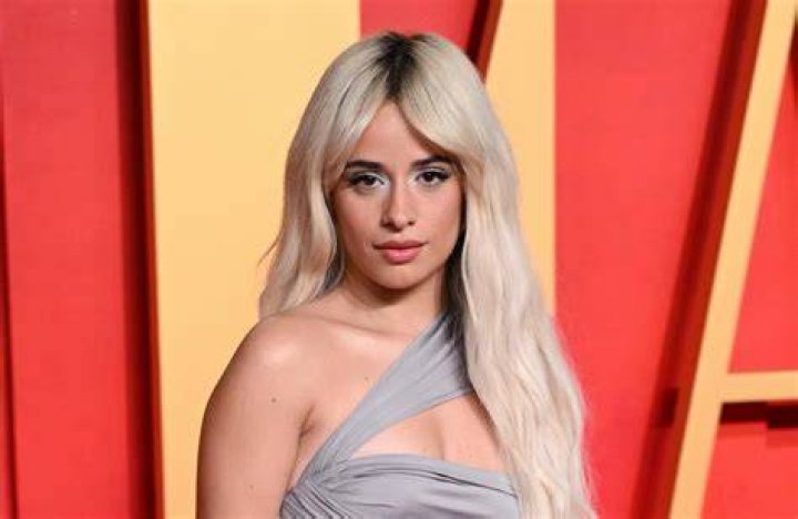 Here she is: Camila was known to be dating Lewis after fans once again spotted on social media that she was at the hunk's house