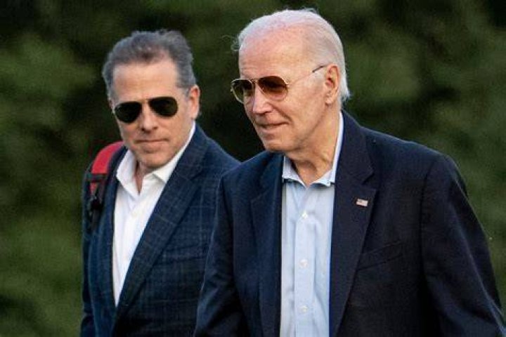 Joe Biden is pictured with his father Joseph Robinette Biden Sr, who died in 2002 aged 86