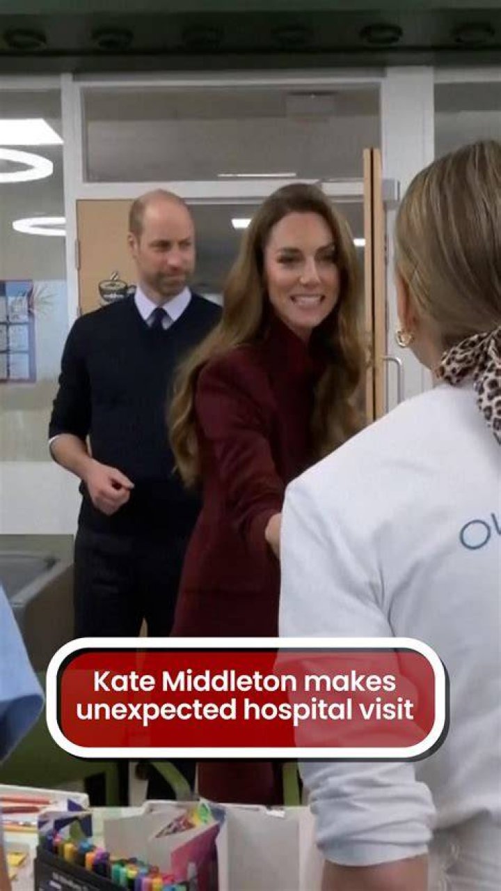 kate middleton with staff during a visit to the Windsor Family Hub 