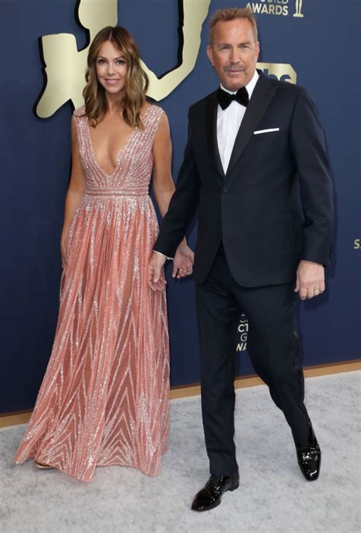 Kevin Costner and Christine Baumgartner on February 9, 2015 in Hollywood, California | Source: Getty Images