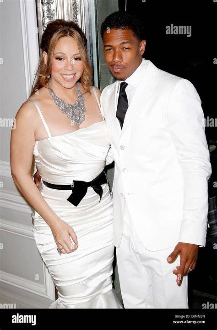 Mariah Carey and Husband Nick Cannon arrive at the 20th Annual Screen Actors Guild Awards at The Shrine Auditorium on January 18, 2014, in Los Angeles, California. | Source: Getty Images.