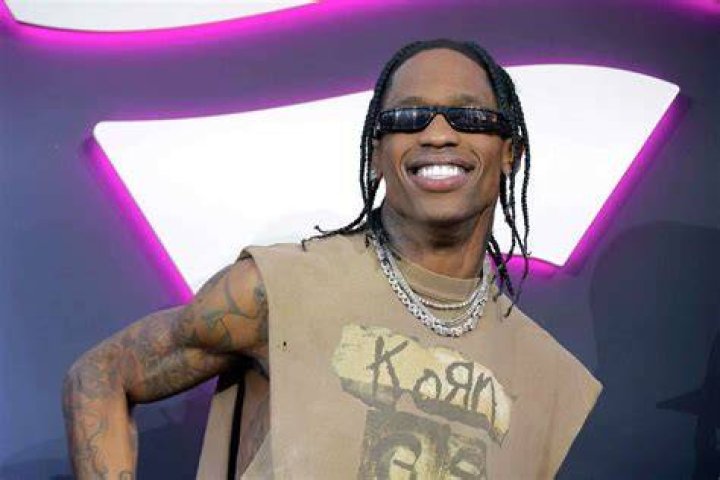 Mingling:&nbsp;Rapper Travis Scott, 32, was pictured mingling with friends at the event