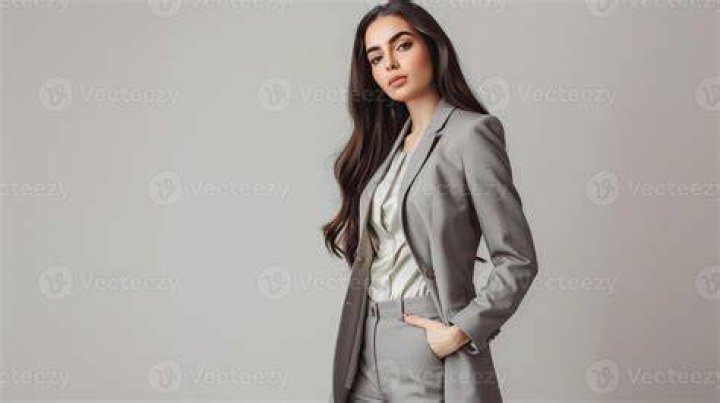 model wearing a grey work suit