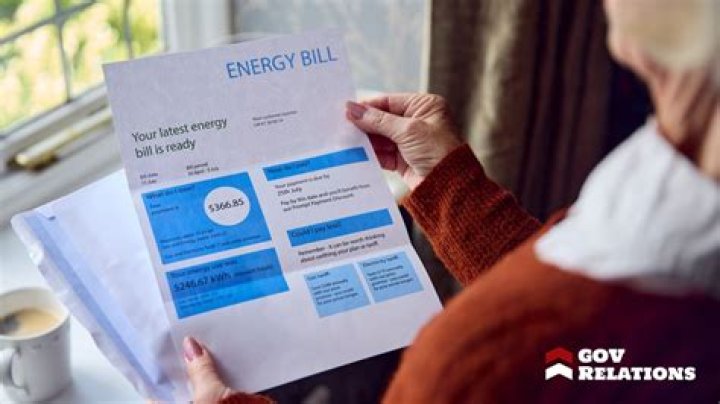 Person holding utility bills | Source: Unsplash