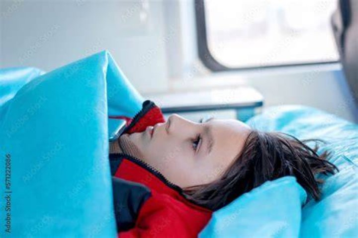 PHOTO: A boy is transported from a fatal school bus crash in Bastrop County, Texas, March 22, 2024.