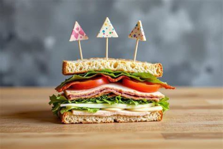 PHOTO: Sandwich triangles held together with toothpicks sit on a cutting board in an undated stock photo.