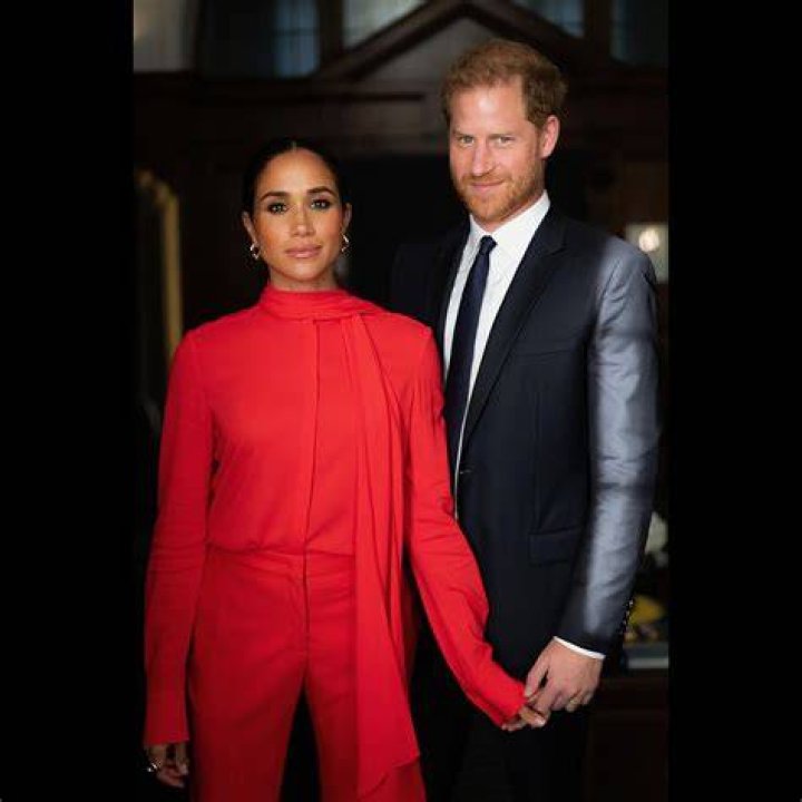 Prince Harry holding hands with Chelsy Davy