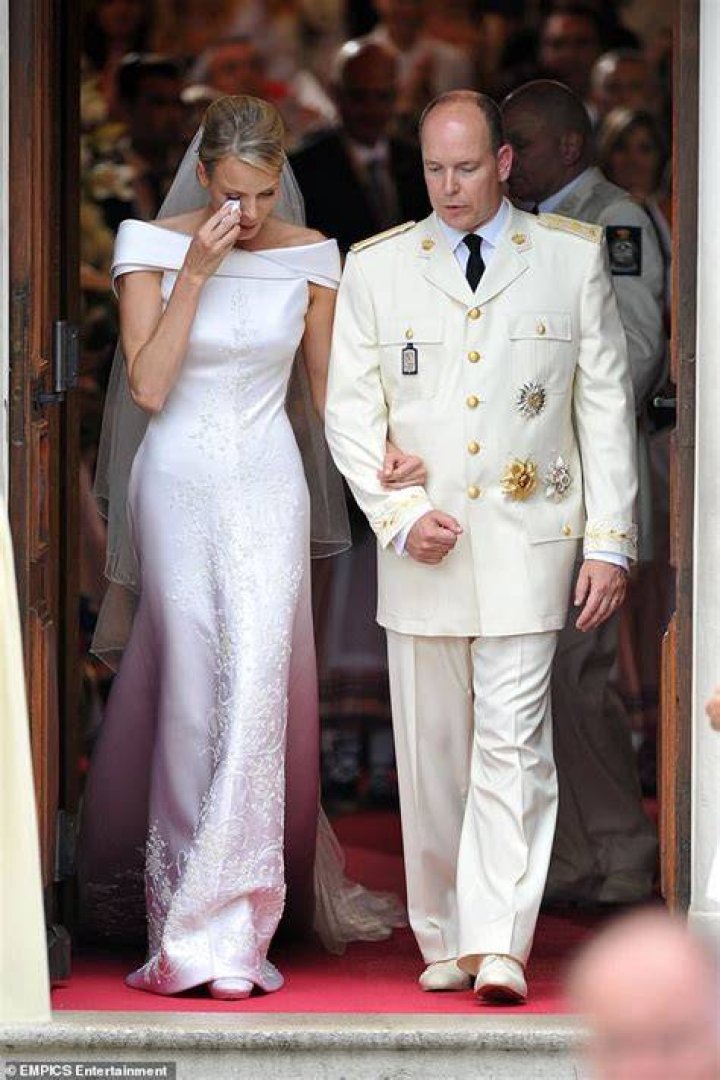 Princess Charlene wipes away a tear at royal wedding