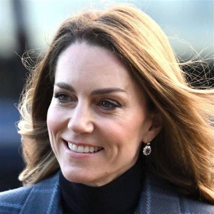 Princess Kate wearing her bouncy locks down loose