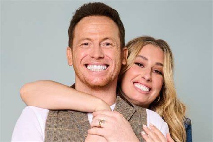 Stacey Solomon and Joe Swash pose at a friend's wedding in Austria