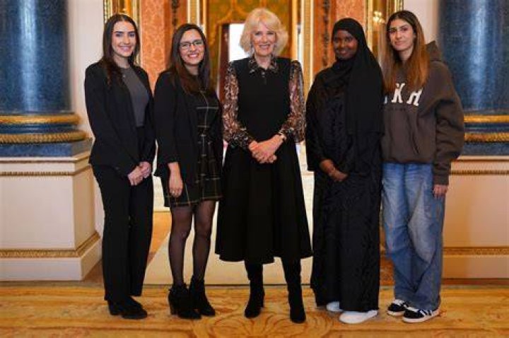 The Queen with the changemakers, Chief Executive Ellen Miller, Chair of Trustees Isabel Boyer and young persons authentic voice coordinator Kristie Waller