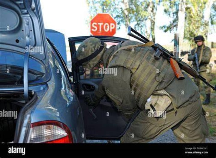 The suspect was stopped from throwing a second by a bystander who hit it out of his hand
